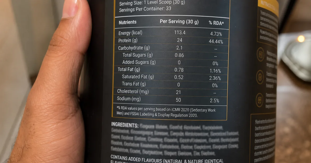 Close-up of a protein nutrition panel and ingredient list on an unlabeled tub
